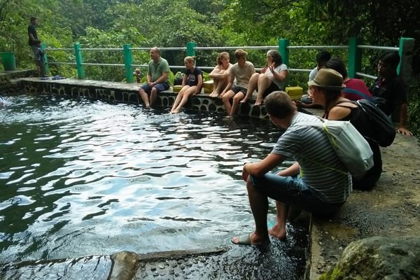 Walking through tropical rice paddies in Central Lombok