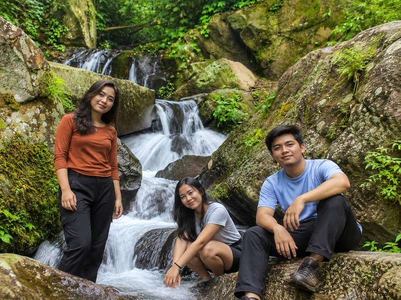 Visitors enjoying Aik Berik waterfall Lombok