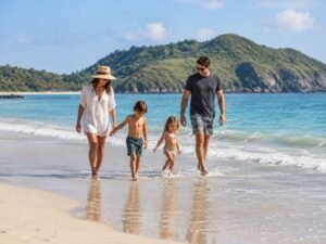 family beach day at Mawi Beach with children near the shoreline